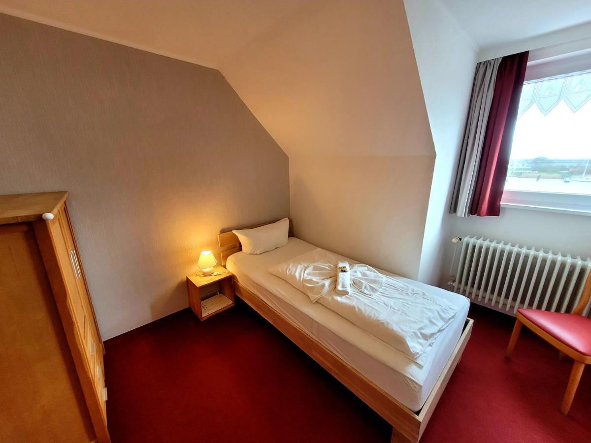 Hotel An'T Yachthaven à Harlesiel Chambre photo